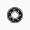 Close-up of Broc high-grade 7-ball ceramic 608 skateboard and inline skate  bearings in stainless steel casing with corrosion-resistant rings and reinforced polymer cage.